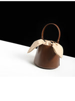 Load image into Gallery viewer, Smting | Small Leather Bucket Bag with Knot and Pearl details