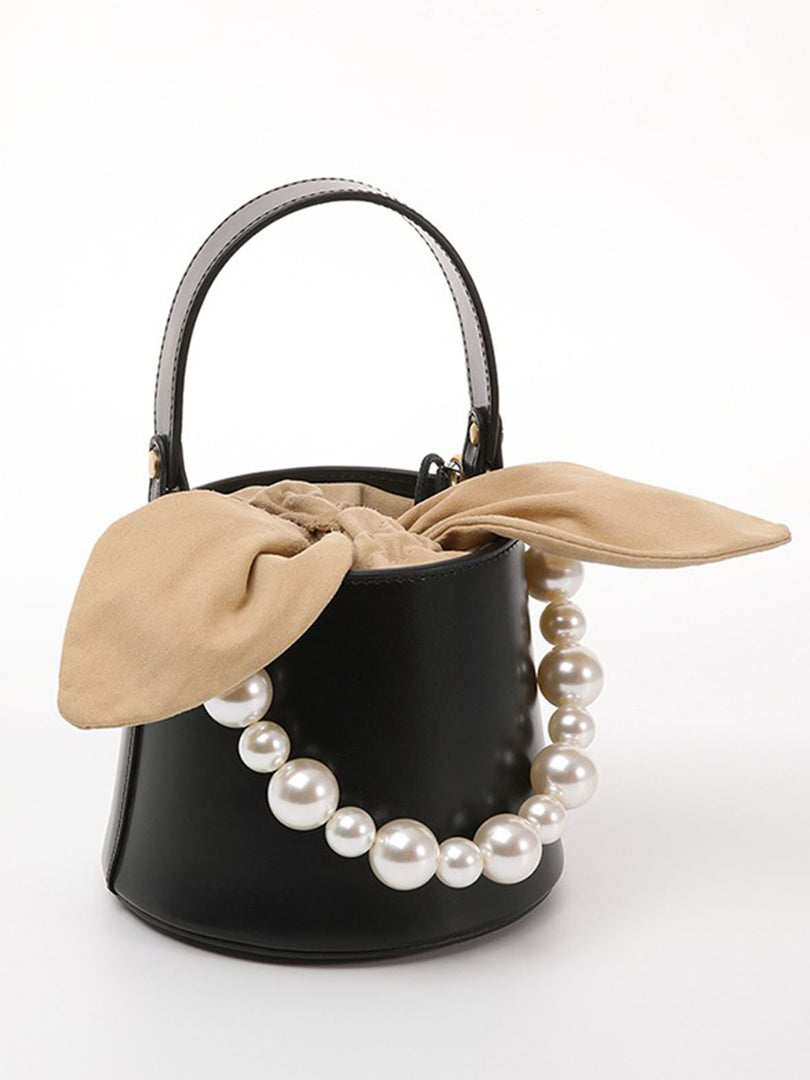 Smting | Small Leather Bucket Bag with Knot and Pearl details