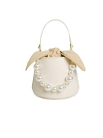 Load image into Gallery viewer, Smting | Small Leather Bucket Bag with Knot and Pearl details
