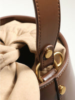 Load image into Gallery viewer, Smting | Small Leather Bucket Bag with Knot and Pearl details
